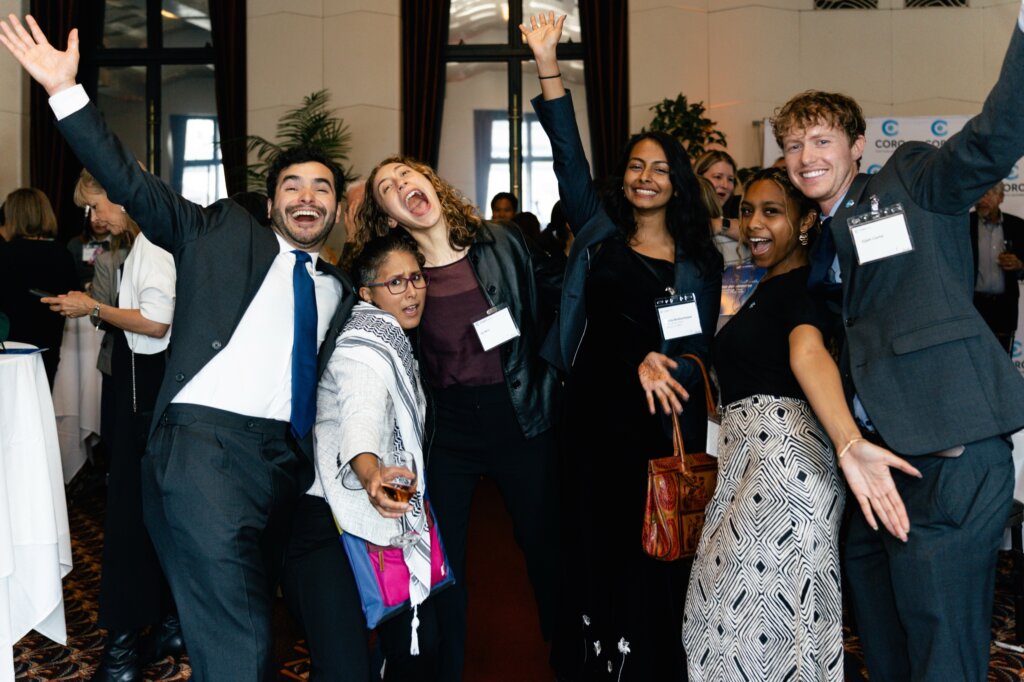 Coro community members celebrating together at an event