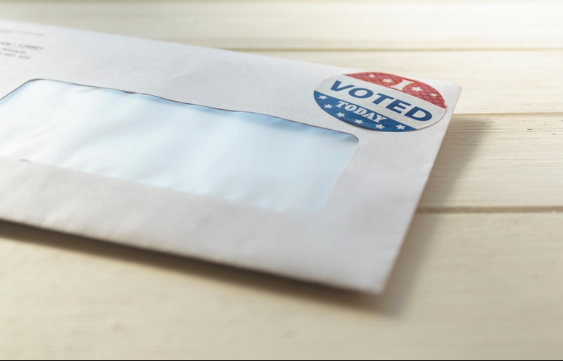 A vote-by-mail envelope with an I Voted Today sticker.